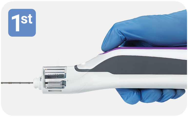 AutoCore™ device in gloved hand
